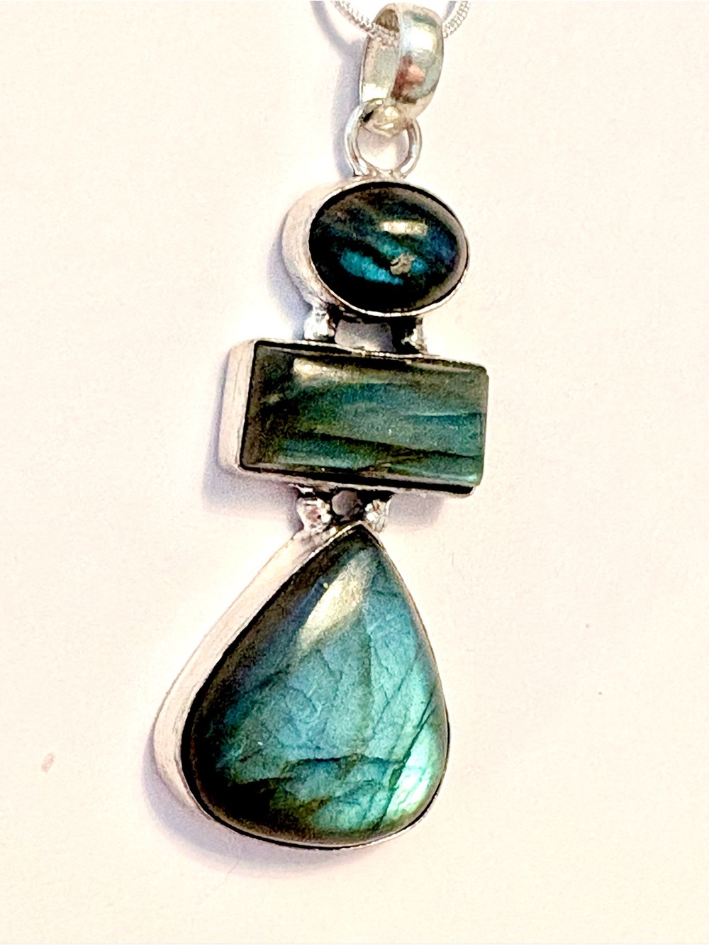 3 inch, 3 stone, 925 marked, Labradorite gemstone pendant on a silver chain.
